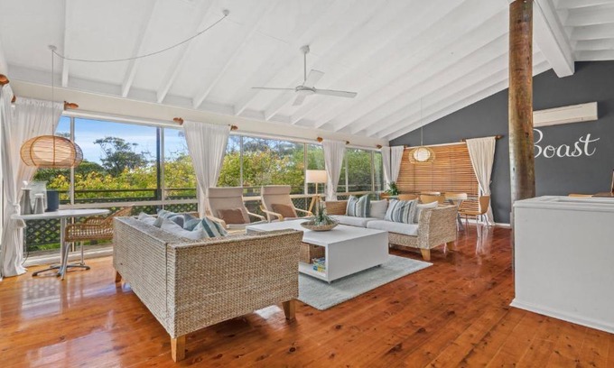 Copacabana House | Sublime Beach Getaway, Spacious Balcony with BBQ