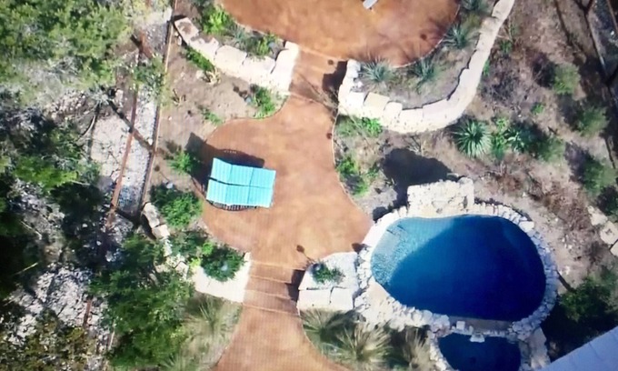 Concan House | Sublime Oasis, Plunge Pool, Waterfall, Cabana, 2 Fireplaces, View Terraces!