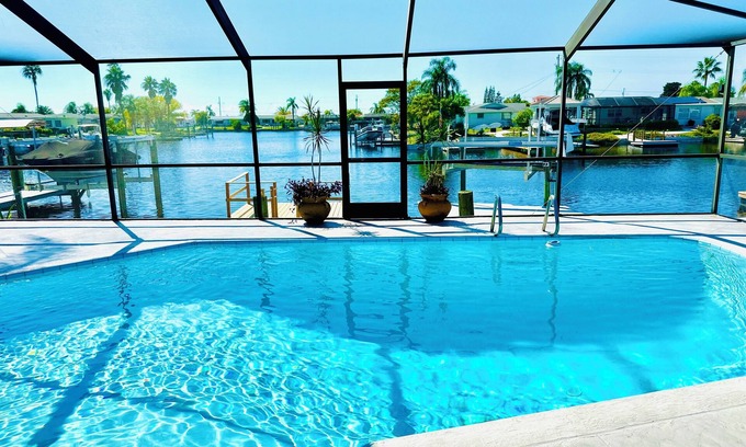 Port Richey House | Sunset Shores, 2/2 pool canal home with Gulf access in nice quiet neighborhood