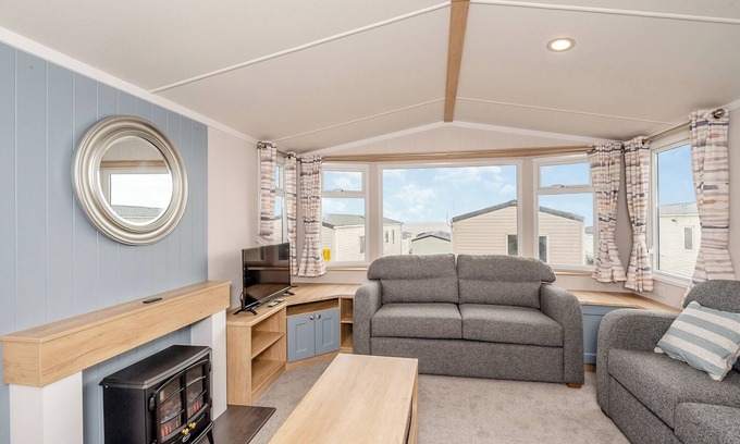Otterton House | Super 12ft-wide luxurious caravan with one double and two twin.