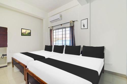Chikkamagaluru Hotel | Super Collection O Chikmangaluru Near Railway Station