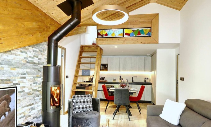 Courchevel Apartment | Superb penthouse with a fireplace and a mezzanine
