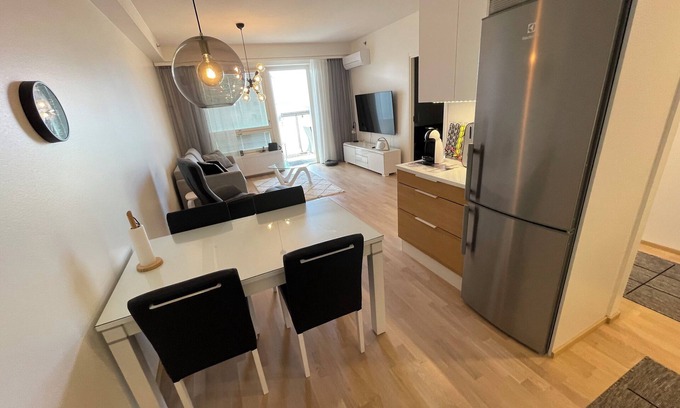 Tampere Apartment | Tampere city view near Nokia Arena - 14th floor with big balcony and sauna (AC)