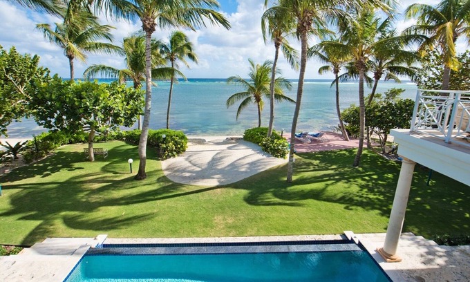 South Sound House | Tatenda: Estate Villa w/Private Pool, Balcony Suites, Paddle Boards & Snorkeling