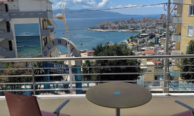 Sarande Apartment | The apartment has a beautiful view of the city and the sea with a balcony.