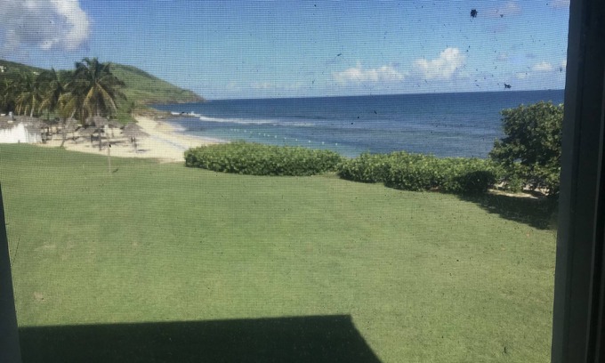 Estate Sion Farm Condo | THE BEST OF GENTLE WINDS. Luxurious unit overlooking the beach.