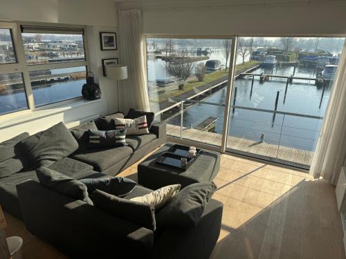 Municipality of Aalsmeer House | The Boathouse with boat