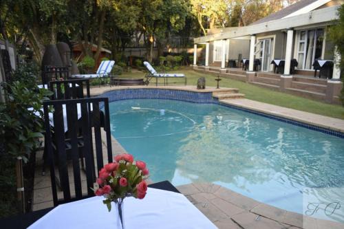 Waterkloof Glen House | The Flamingo Suite at Frederick's Place