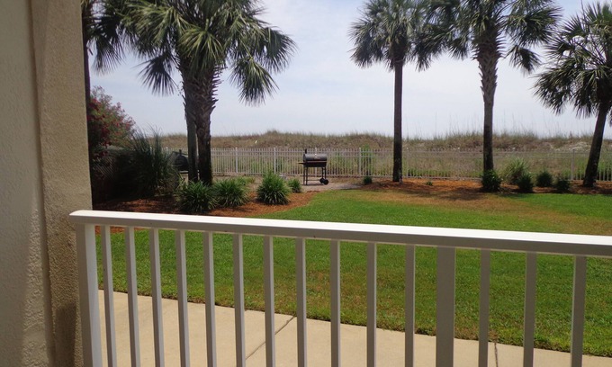 Dauphin Island Condo | The Inn at Dauphin Island 102 Walk right out to Pools and Beach!