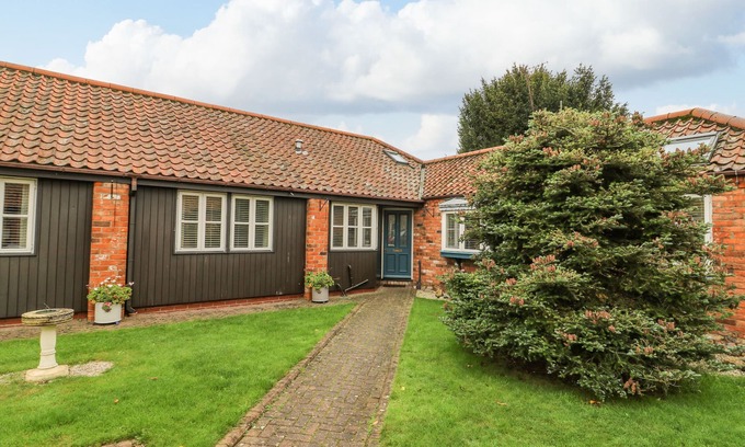 Leven House | THE OLD WAGON SHED, pet friendly, with hot tub in Leven Near Beverley