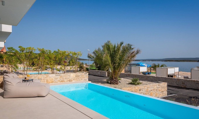 Tkon Villa | The Palms Resort - Villa Beach IV