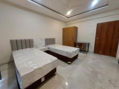 Wagholi Hostel | The Tristar Coliving