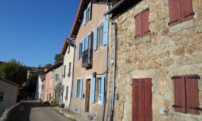 Saint-Pierreville House | Traditional blue-shuttered stone house in a stunning Ardeche mountain village.