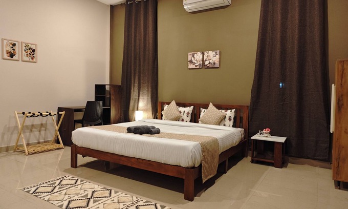 Jorhat House | Tranquil Greenery Meets Urban Convenience