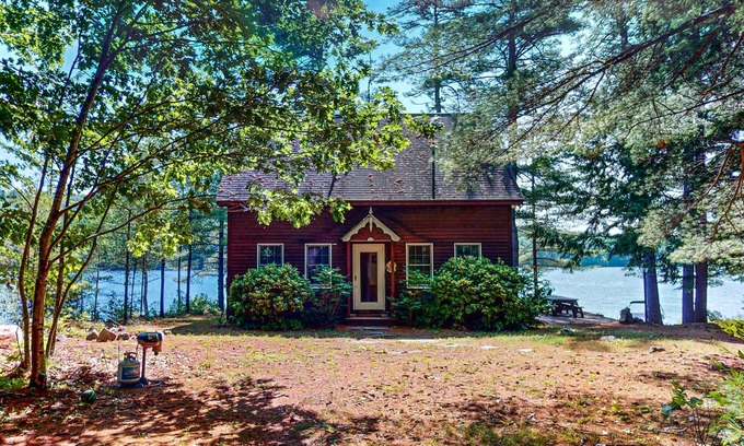 South Casco House | Tranquil Lakefront Retreat with large outdoor patio, beach and Stunning Views