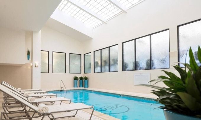 Goat Island Hotel | Tranquil Newport Getaway: Four Serene Waterview Rooms | Pets are Allowed