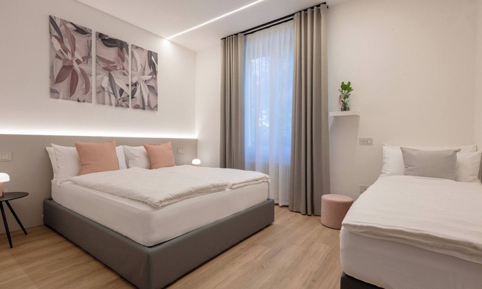 Trento House | Triple room consisting of double bed and single sofa bed