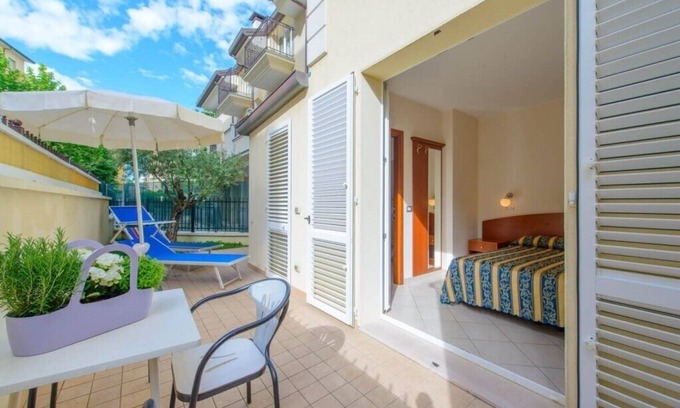 Viserbella Apartment | TWO-ROOM APARTMENT 20 meters from the sea with courtyard, in Viserba, with covered parking.