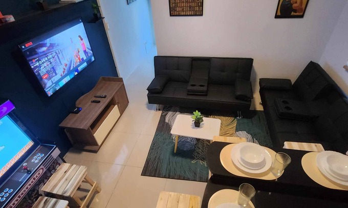 Valenzuela Condo | Ultimate Staycationnw/Jacuzzi and Arcade