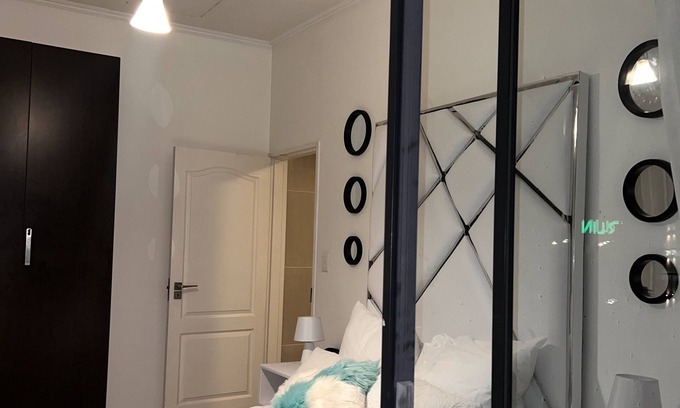 Greater Johannesburg Metropolitan Area Apartment | Unique and comfortable accommodations in the heart of our vibrant city.