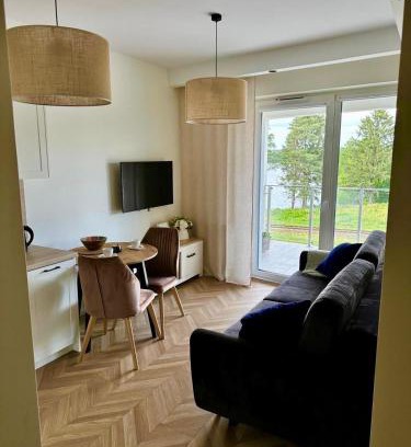 Augustow Apartment | Urokliwy Apartament z dużym tarasem i widokiem na Jezioro Białe