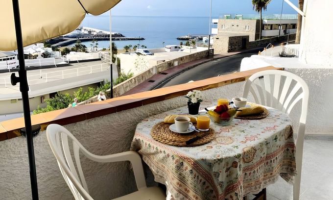 Puerto Rico Apartment | Vacation 'Pura Vida' with Sea View, Shared Pool and Wi-Fi