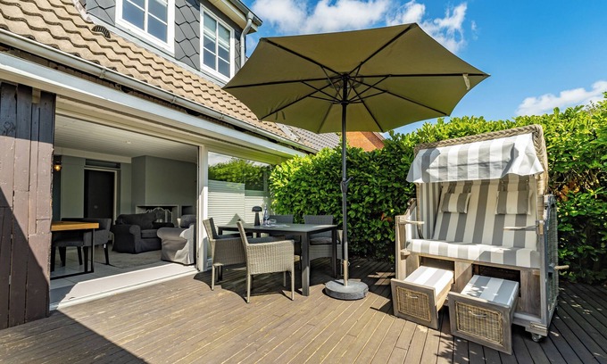 Tinnum House | Vacation home in Tinnum with fireplace and terrace.