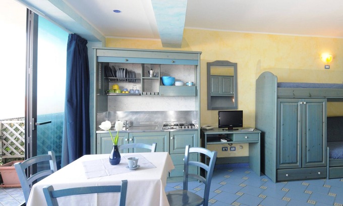 Province of Messina House | Vacation Home "Oasi Azzurra - Monolocale Standard 1" with Shared Pool & Shared Terraces