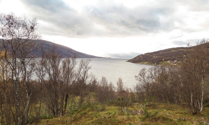 Korsfjorden House | Vacation home on a hill with beautiful views of the sea and the mountains.