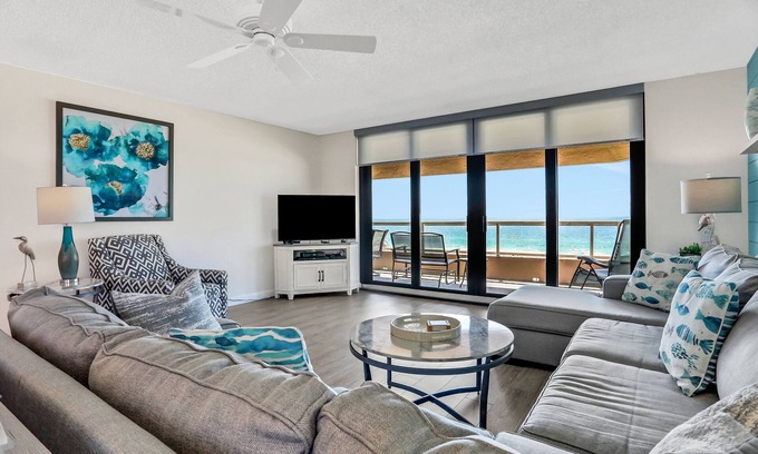 Sand Key Condo | Vibrant, ocean-view condo with hot tub, tennis court, pool, W/D, balcony & grill
