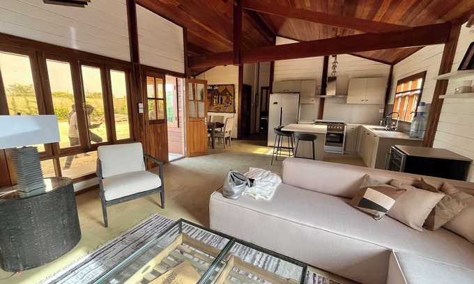 Mbodiene Ski Chalet | Villa Siga Fall ~ Elegant Wooden 2BR Retreat Near la Petite Côte.