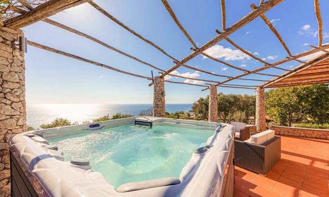 Gagliano del Capo Ski Chalet | Villa with heated jacuzzi and 180° sea view