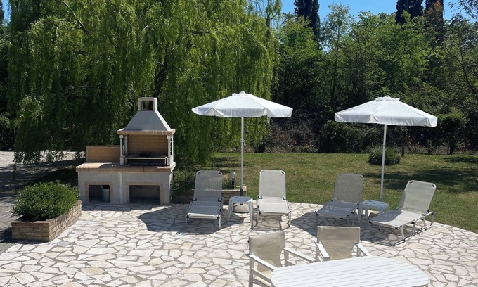 Ano Korakiana Villa | Village View’ is a beautifully built two-bedroomed villa for a relaxing holiday