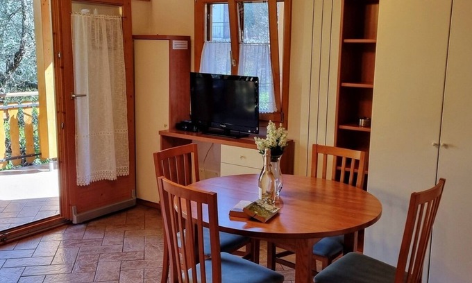 Villaggio Sanghen Apartment | Villaggio Heliopolis Cottage 84 with terrace 2 minutes from the lake