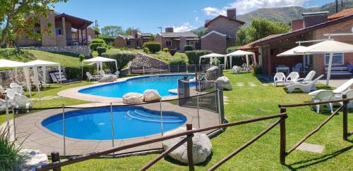 La Falda Hotel | Vista Bella Cabañas