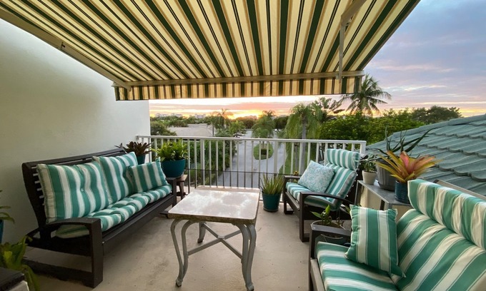 Bella Vista Condo | Walk to Jupiter Beach! 3 bdrm condo with private balcony.
