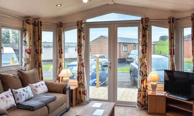 Cockermouth Cottage | Welcome to Ashness, a delightful two-bedroom caravan in scenic Moota.