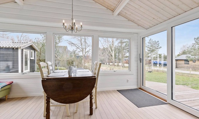 Skibby House | Welcome to this cozy wooden holiday home for a wonderful vacation.