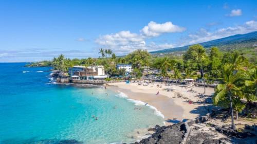 Kahaluu Bay Apartment | White Sands Beach Condo #324. BIG PATIO! Ocean and Mountains across from beach!