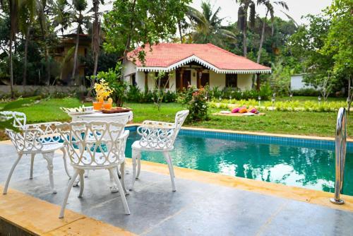 Saligrama Villa | White Serenity Heritage Pool Villa near Beach Udupi