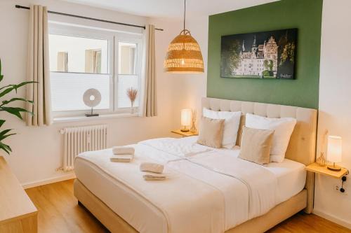 Wolfsburg Apartment | Wohlfühlapartment, Parkplatz, Boxspringbetten, Massagesessel, Nespresso, 1Gbit LAN & WIFI, Innenstadt