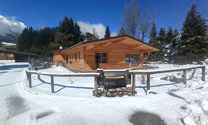 Andalo Ski Chalet | Wooden chalet surrounded by greenery