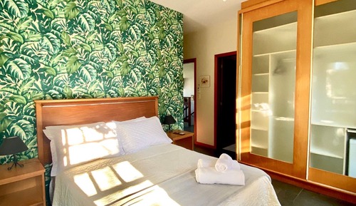 S6 - Suíte Praia da Armação - Pousada Tulipane com Piscina - Campeche