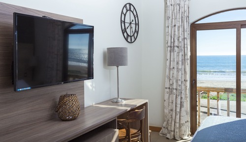Habitación Superior cama extragrande con vista al mar y desayuno buffet