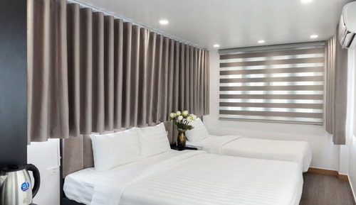 Deluxe Triple Room, City View
