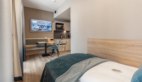 Comfort Single Room, Kitchen, Courtyard View