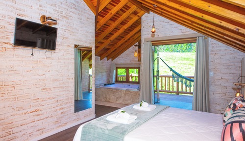 Chalé VII com hidromassagem e vista para as montanhas