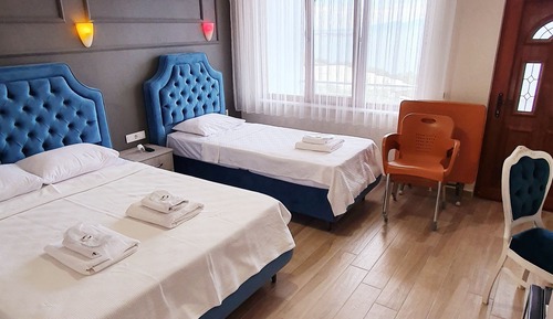 Deluxe Triple Room, Multiple Beds, Non Smoking, Sea View