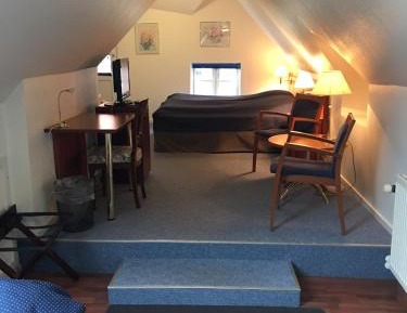 Quadruple Room with Private Bathroom