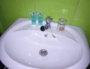 Quadruple Room with Private Bathroom